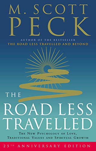Book cover: "The Road Less Travelled" by M. Scott Peck, with gold sunburst design.