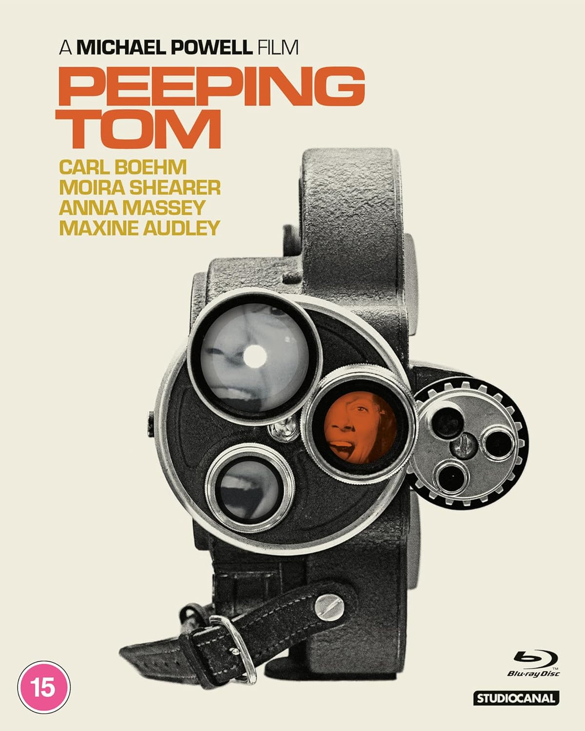 Blu-ray cover for Peeping Tom featuring a vintage film camera with faces in lenses.
