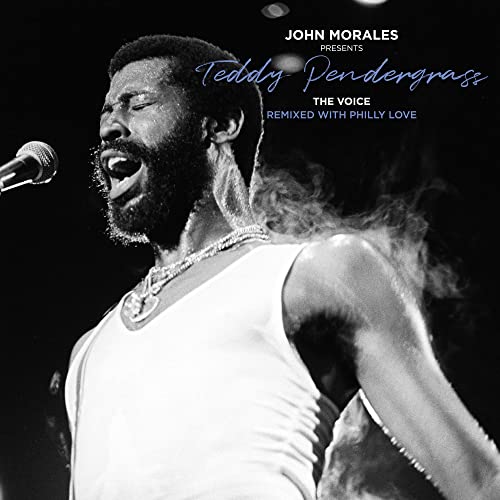Teddy Pendergrass singing into a microphone, black and white portrait.