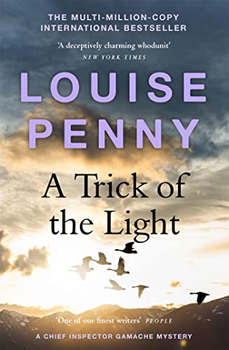 Book with dark cover, white text, and author/artist name, likely Louise Penny's mystery novel.