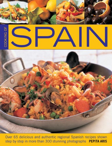 Cookbook cover titled Cooking of Spain featuring a large pan of seafood paella.