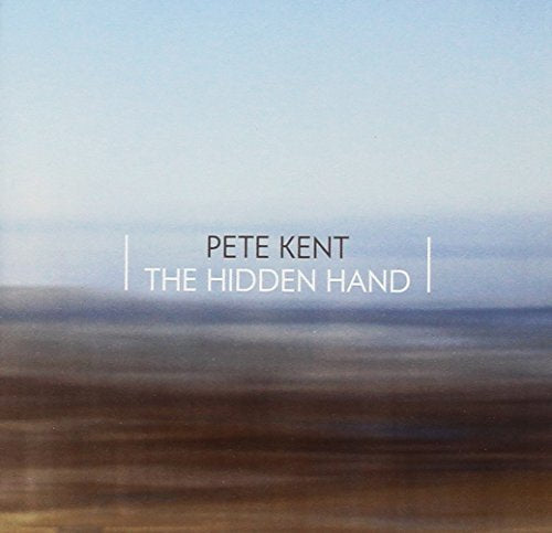 CD cover for Pete Kent’s “The Hidden Hand” with blurred landscape.