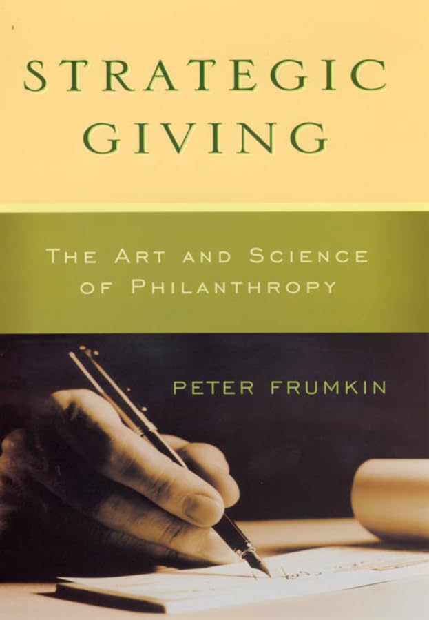 Book cover: “Strategic Giving” with a hand writing with a pen.