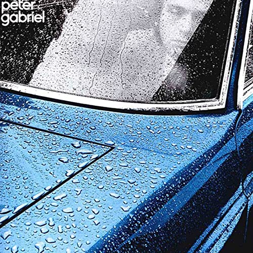 Peter Gabriel's "Car" album cover: a blue car with raindrops on glass.