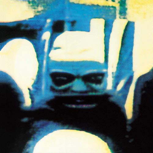 Peter Gabriel album cover, distorted blue face with dark eyes.