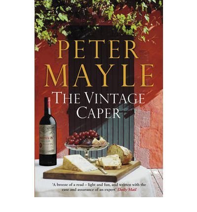 Book cover: "The Vintage Caper" with wine, cheese, and fruit still life.