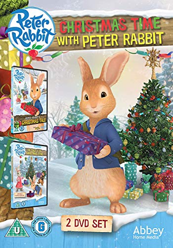 "Peter Rabbit DVD cover featuring Peter Rabbit holding a gift beside a Christmas tree."