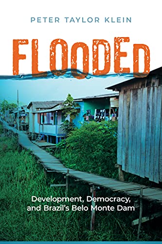 Book cover with title "Flooded" and image of waterside houses.