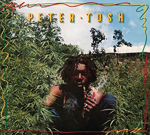 Peter Tosh smoking a pipe in a cannabis field on the Legalize It album cover.