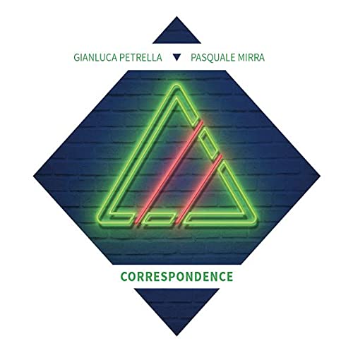 Vinyl record cover with geometric neon triangles and text “Correspondence”.