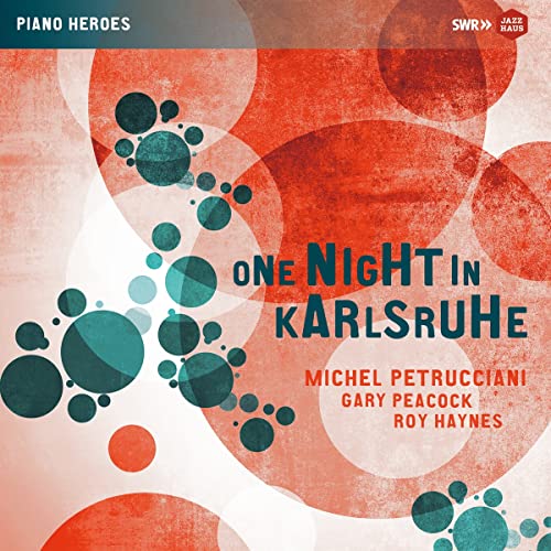 Vinyl album cover: abstract circles, text “One Night in Karlsruhe”, artist names.