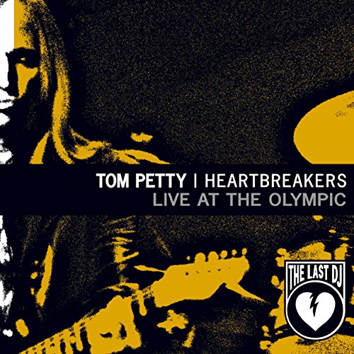 Tom Petty and the Heartbreakers album cover with guitar and text.