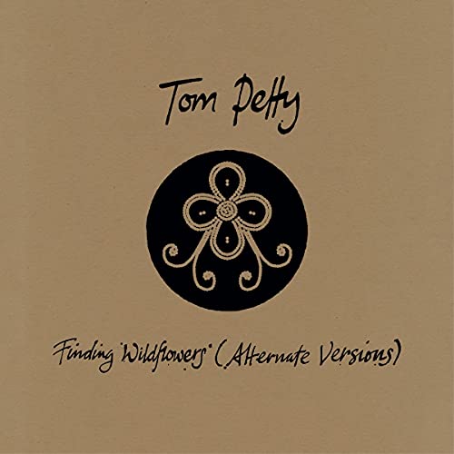 Tom Petty album cover: brown background with black floral design and text.