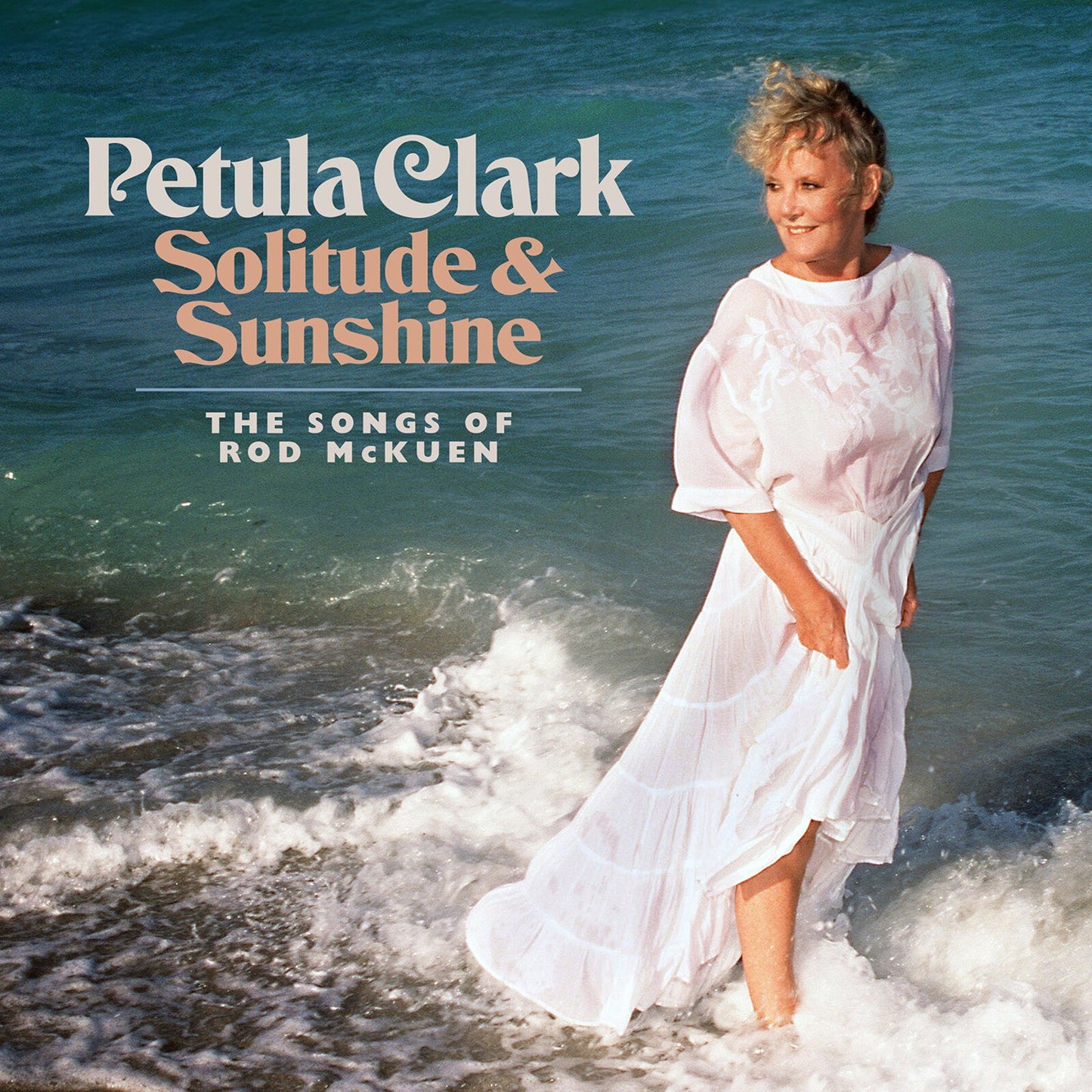 Petula Clark album cover, standing in ocean waves, smiling.