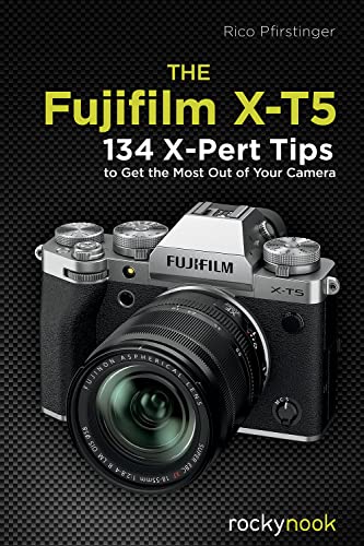 Fujifilm X-T5 camera on a black background with yellow and white text overlay.