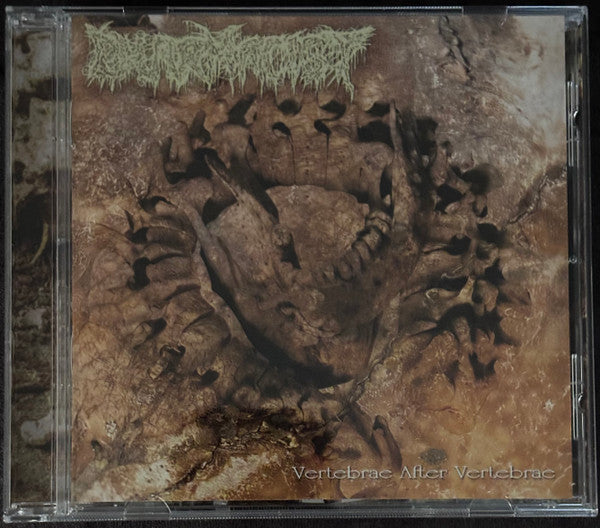CD case with a dark, textured image of spines and skeletal forms.