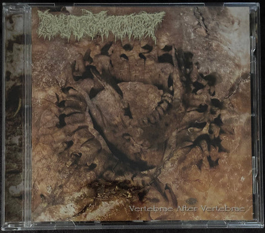 CD case with a dark, textured image of spines and skeletal forms.