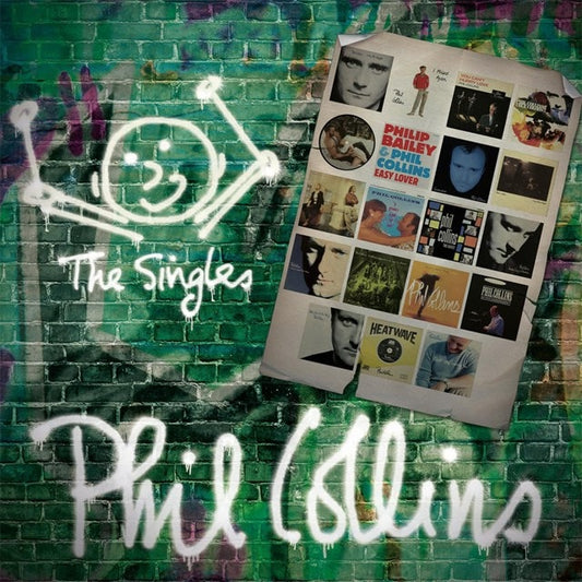 Phil Collins “The Singles” vinyl record cover against a graffiti wall.