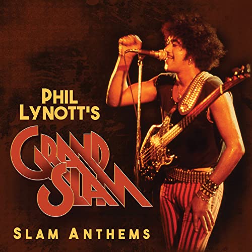 Phil Lynott performing with a bass guitar on album cover.