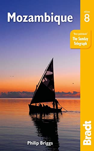 Mozambique travel guide cover with a dhow sailing at sunset.