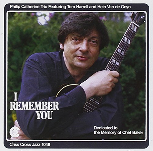 CD cover with a man holding a guitar, titled "I Remember You".