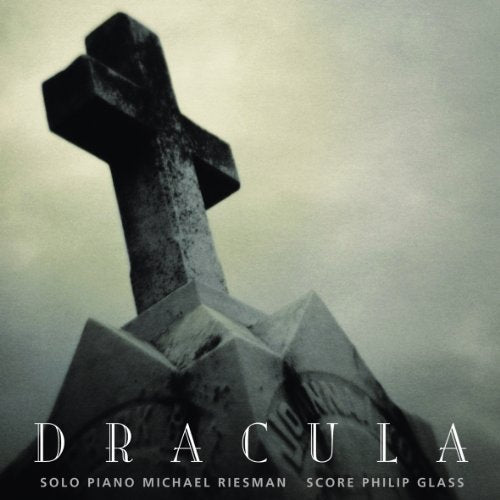 CD cover for Philip Glass’s “Dracula” featuring a weathered stone cross.