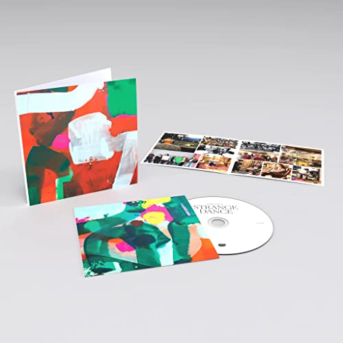 Philip Selway’s “Strange Dance” CD with colorful abstract cover art and booklet.