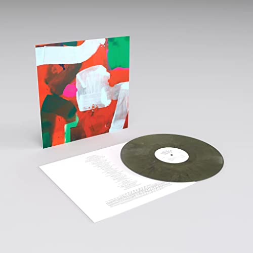Philip Selway’s “Strange Dance” vinyl record with abstract red and green cover art.