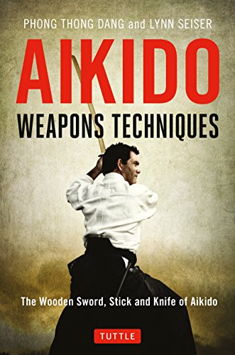 Aikido book cover featuring a martial artist wielding a wooden sword.
