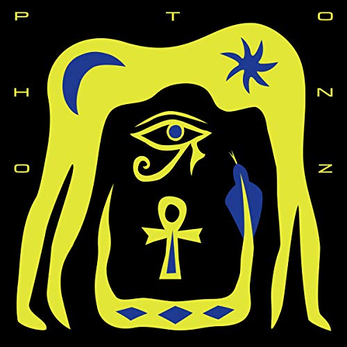 Yellow and black album cover with an eye and abstract shapes.