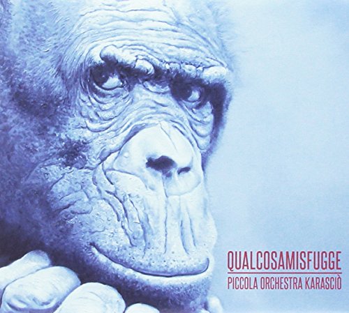 CD cover featuring a close-up, blue-toned portrait of a gorilla’s face.