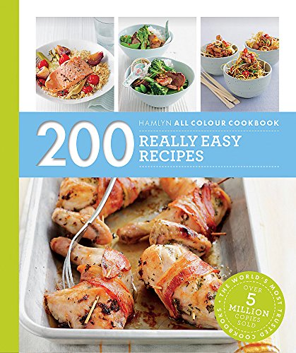 Cookbook cover with images of chicken, salmon, noodles, and vegetables.