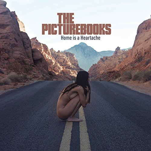 Album cover: desert landscape with a person sitting on a road.