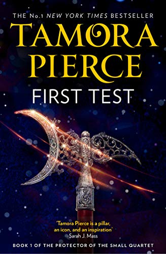 Book cover: “First Test” by Tamora Pierce, featuring a silver crescent blade.