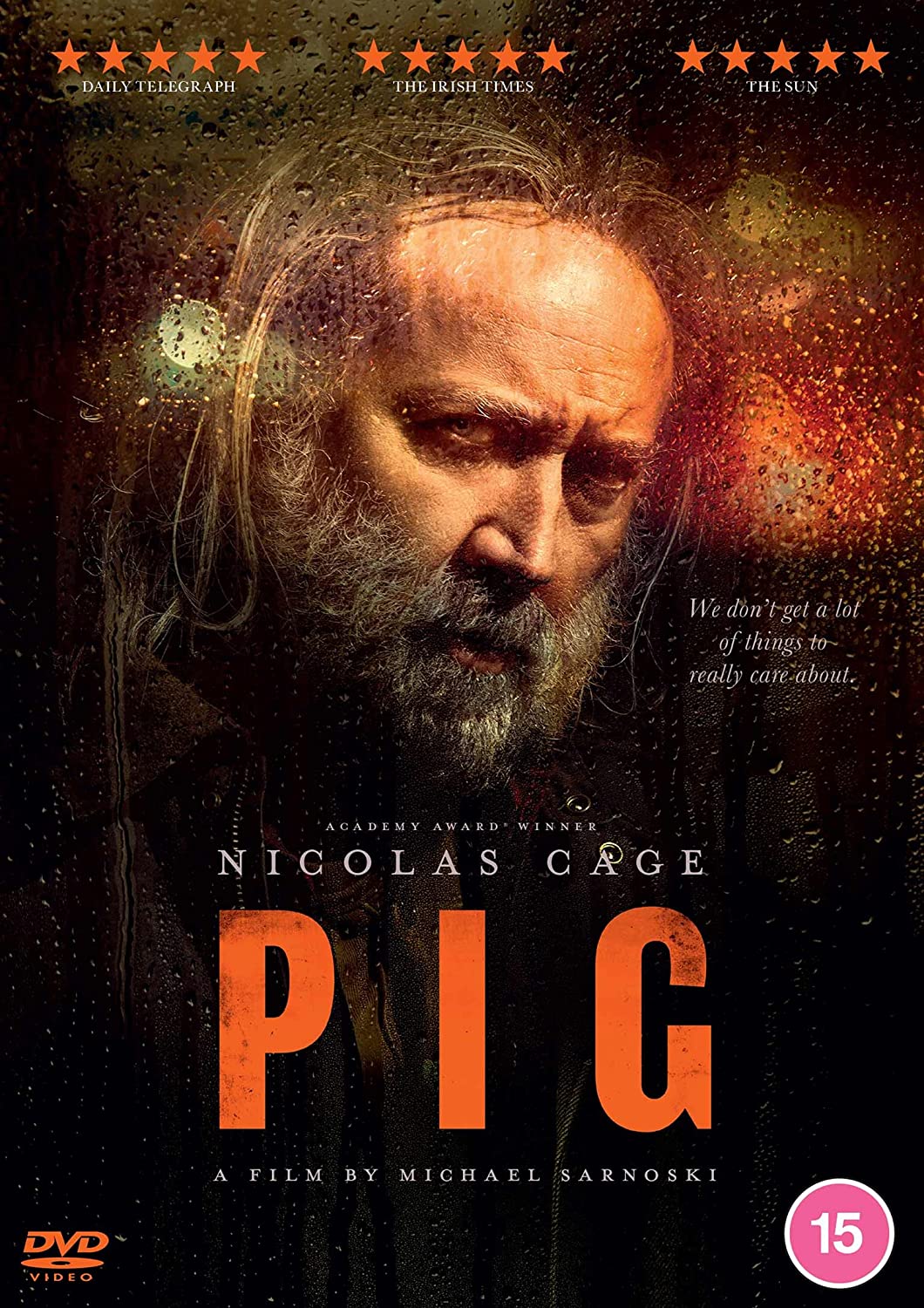 DVD cover featuring Nicolas Cage with a serious expression, surrounded by abstract background.