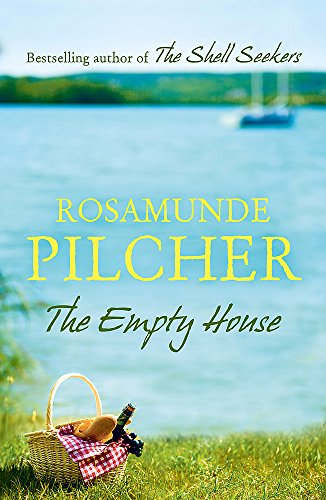 Book cover with coastal scene, picnic basket, and title "The Empty House".
