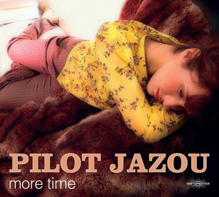 CDLH CD cover featuring a person in a yellow floral shirt lying on fur.
