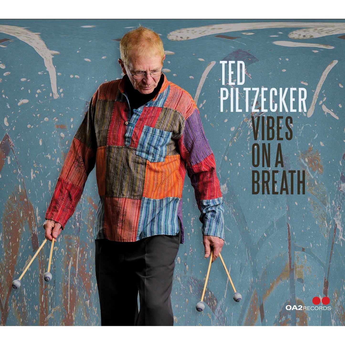 CD cover featuring Ted Piltzecker, a man holding drumsticks, with abstract art.