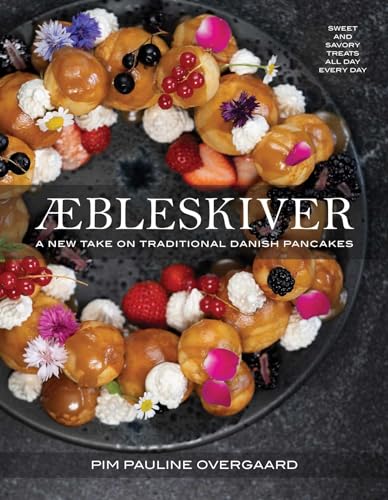 Cookbook cover featuring round Aebleskiver pancakes with fruit and flowers.