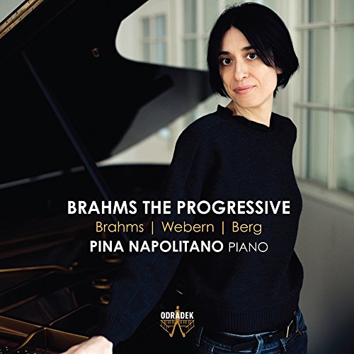 Pina Napolitano portrait beside a grand piano, album cover for classical music.
