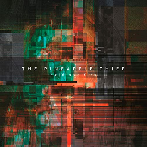 Album cover for The Pineapple Thief’s “Hold Our Fire,” abstract pixelated design.