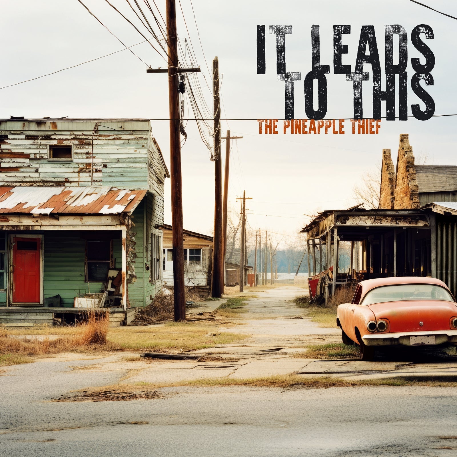 Album cover: dilapidated buildings, a red car, and bold white text.