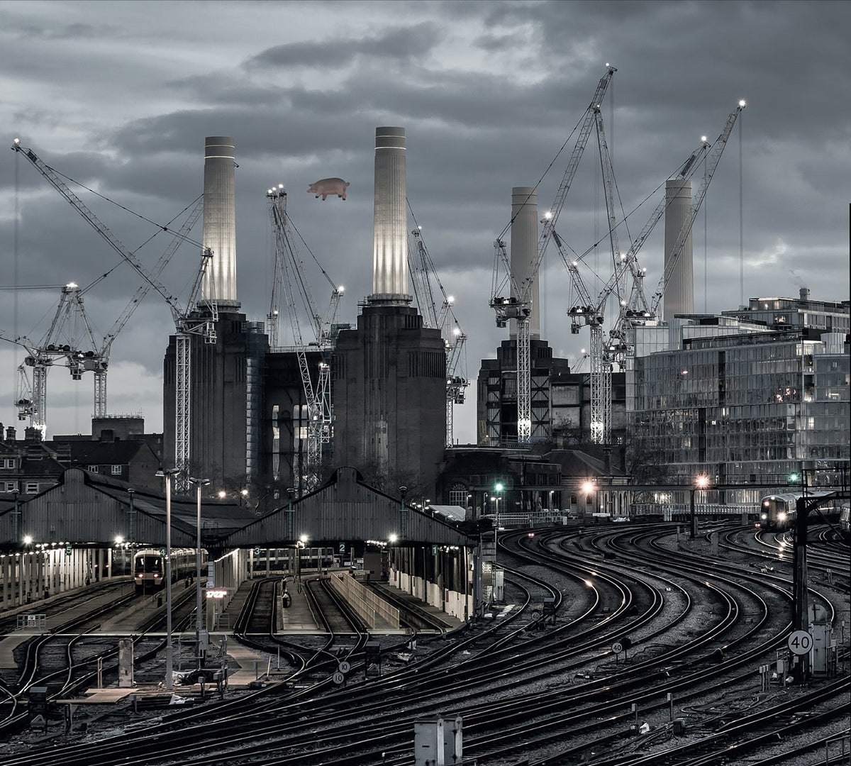 Pink Floyd's *Animals* album cover: power station, cranes, and a floating pig.