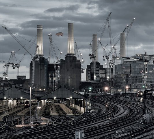 Pink Floyd's *Animals* album cover: power station, cranes, and a floating pig.