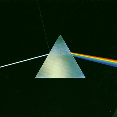 A white light beam enters a glass prism and exits as a rainbow spectrum.