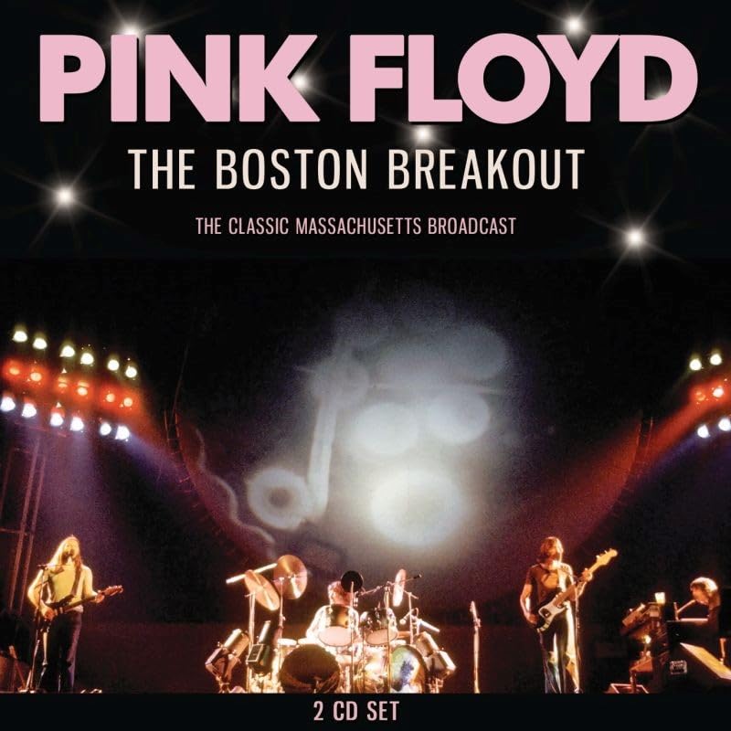 Pink Floyd concert photo with band members performing on stage.