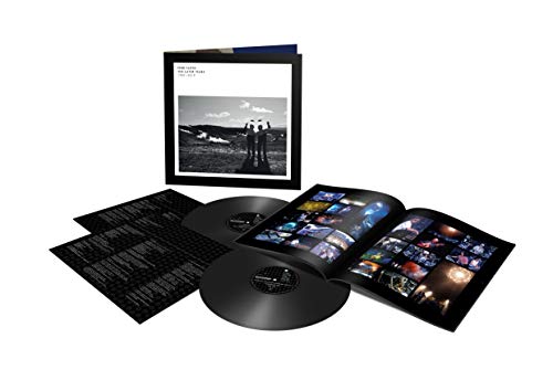 Pink Floyd vinyl box set with cover art, two black records, and a photo book.