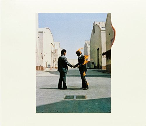 Pink Floyd’s “Wish You Were Here” album cover: two men shaking hands, one on fire.