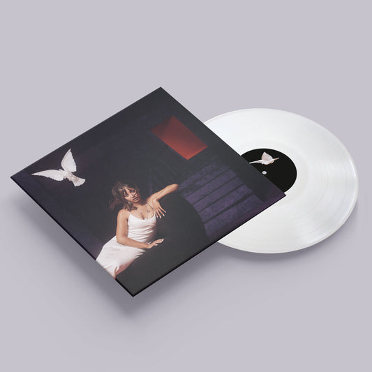 Pinkpantheress “Heaven Knows” vinyl record with black and red cover art.