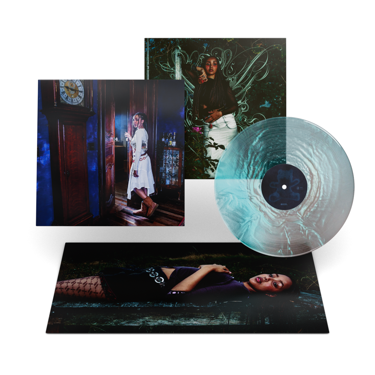 PinkPantheress vinyl record with album art featuring a woman in a blue room.